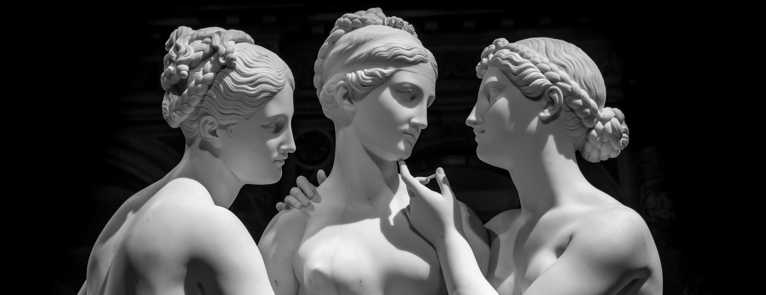 Milan, Italy - June 2020: Bertel Thorvaldsen’s statue The Three Graces. Neoclassical sculpture, in marble, of the mythological three charites.